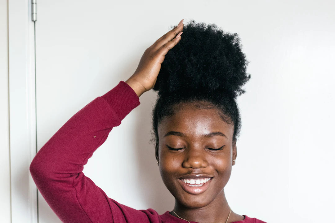 Erreurs à éviter pour bien entretenir vos cheveux afro