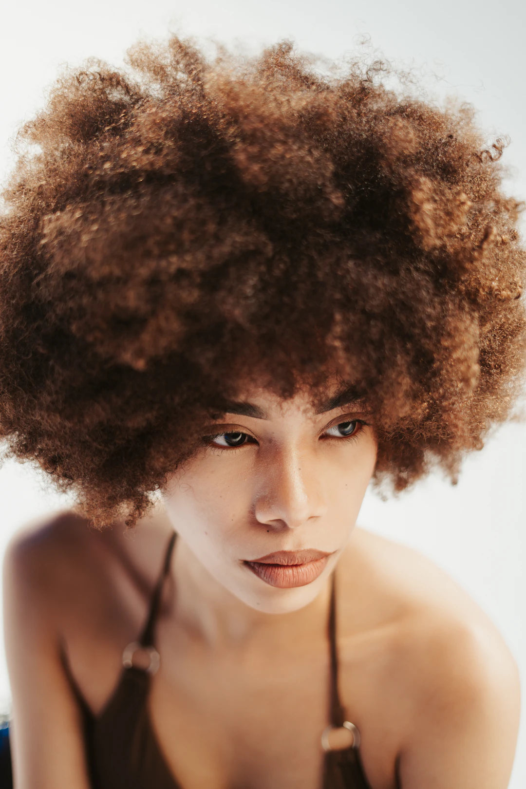 Évitez ces Erreurs avec la Chaleur sur vos Cheveux Afro