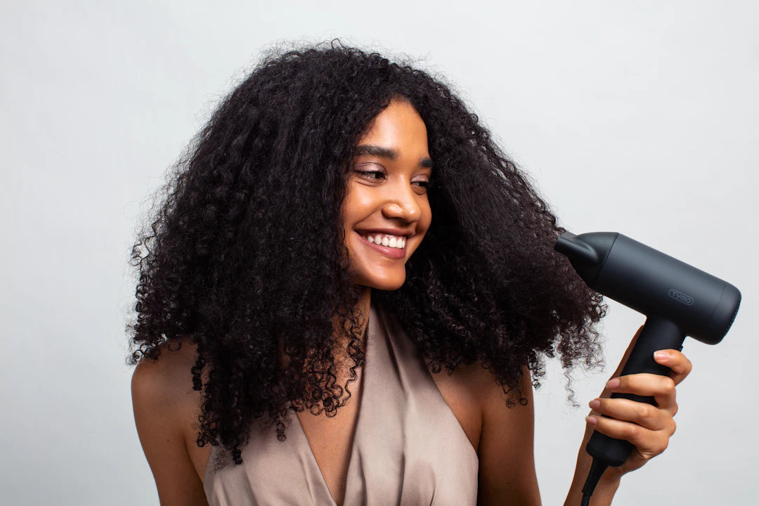Prendre soin des cheveux afro selon chaque saison