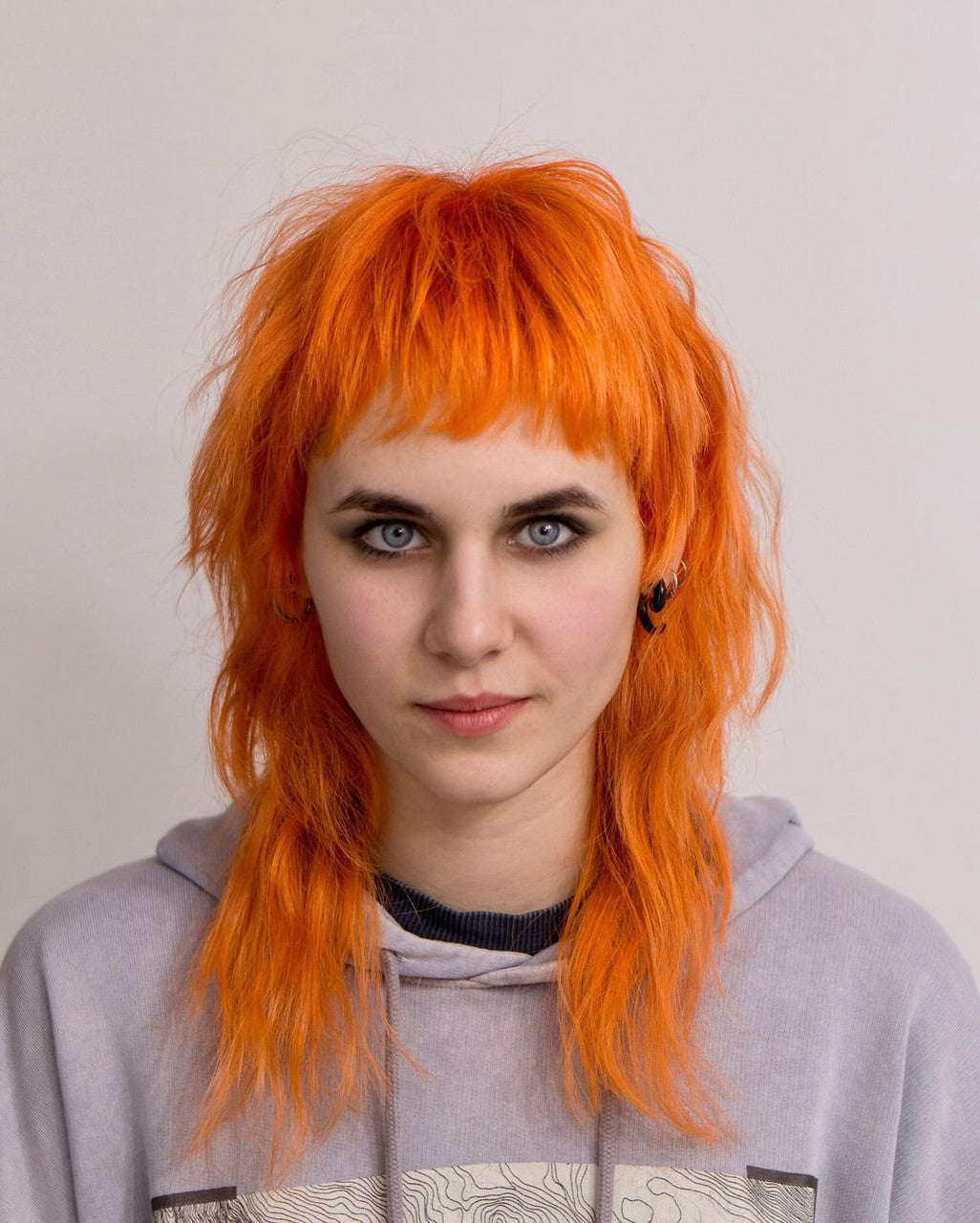 Crazy Color's person with orange hair color by Afro Beauty Store