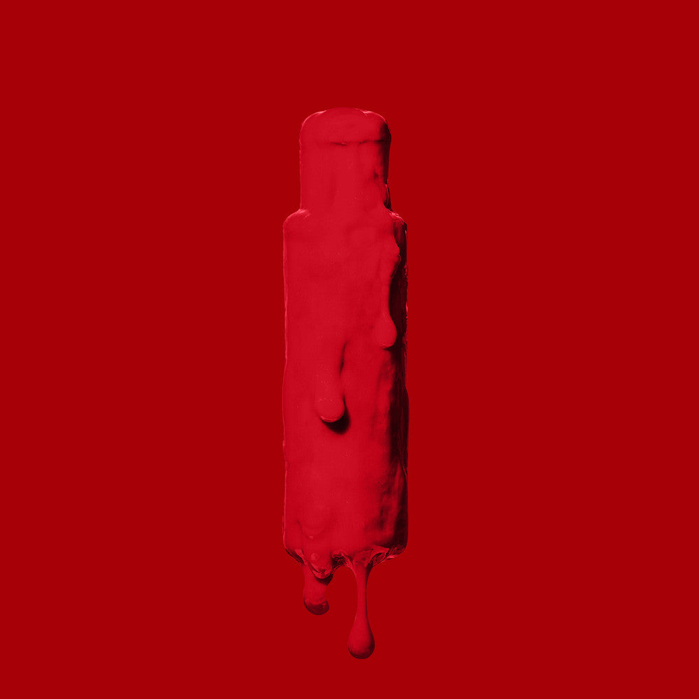 Bottle of Crazy Color Fire 56 100ml hair dye by Afro Beauty Store on a red background