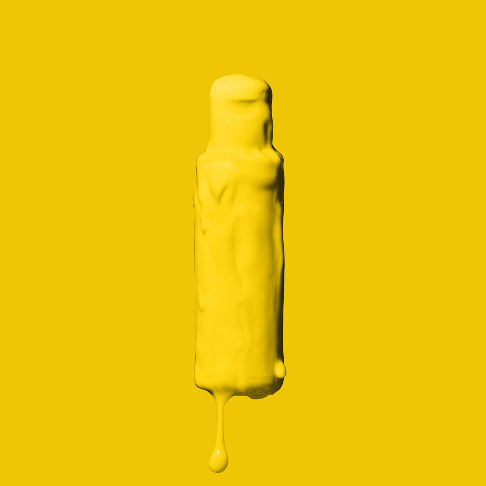 Crazy Color Jaune Canari (Canary Yellow) 49 100ml Hair Dye bottle liquid on a yellow background by Afro Beauty Store