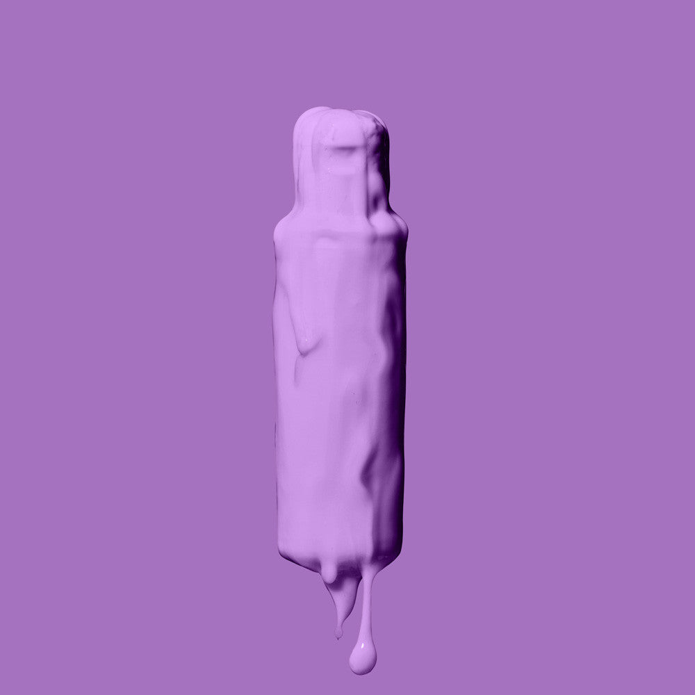 Crazy Color Lavender no. 54 100ml hair dye bottle by Afro Beauty Store on a purple background
