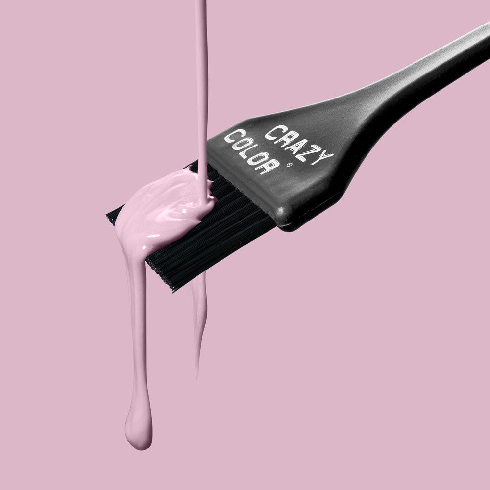 Hair color brush with Crazy Color Marshmallow 64 dye on a pink background, featuring the brand 'Crazy Color' by Afro Beauty Store