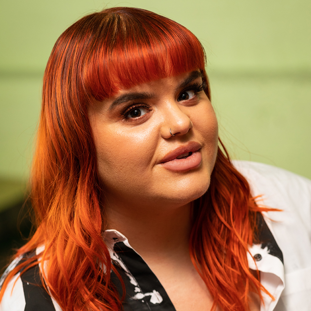 Crazy Color's person with Orange hair by Afro Beauty Store