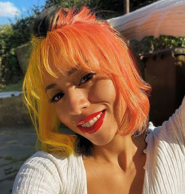 Crazy Color's Person with orange and yellow hair by Afro Beauty Store