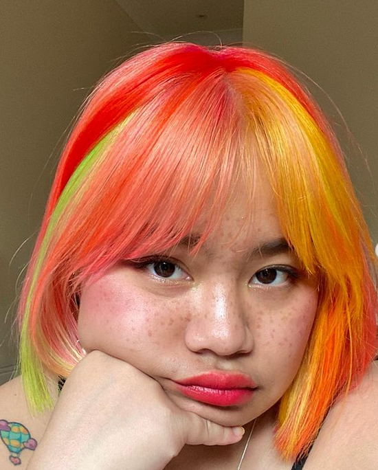Crazy Color's Person with multi color hair by Afro Beauty Store