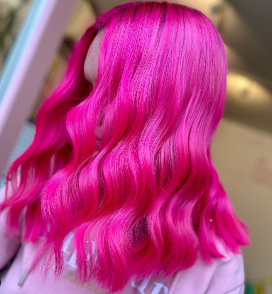 Crazy Color's person with pink hair by Afro Beauty Store