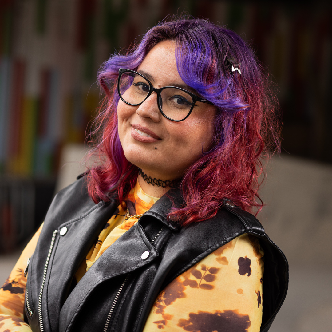 Crazy Color's person with Purple and maroon hair by Afro Beauty Store
