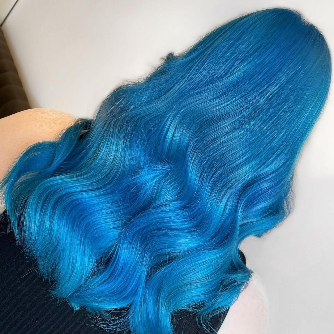 Crazy Color's person with skye blue hair by Afro Beauty Store