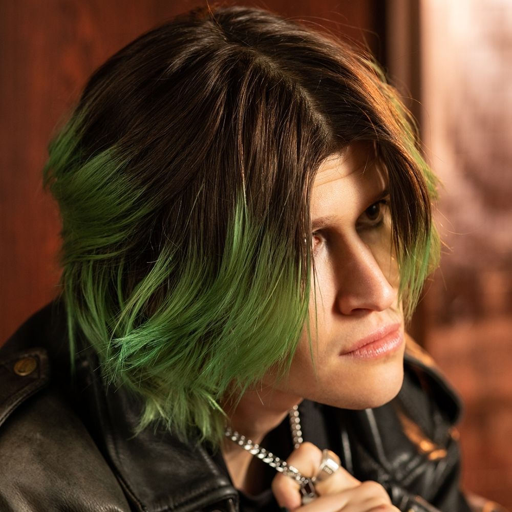 Crazy Color's person with green and black hair by Afro Beauty Store