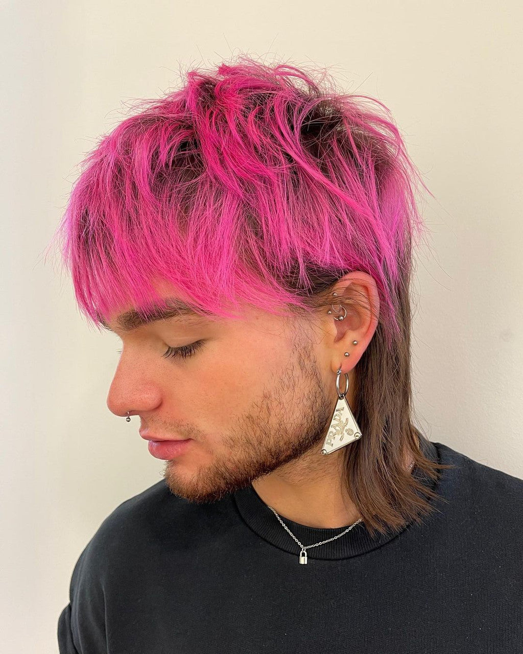 Crazy Color's Person with pink and brown hair wearing a black shirt against a plain background by Afro Beauty Store