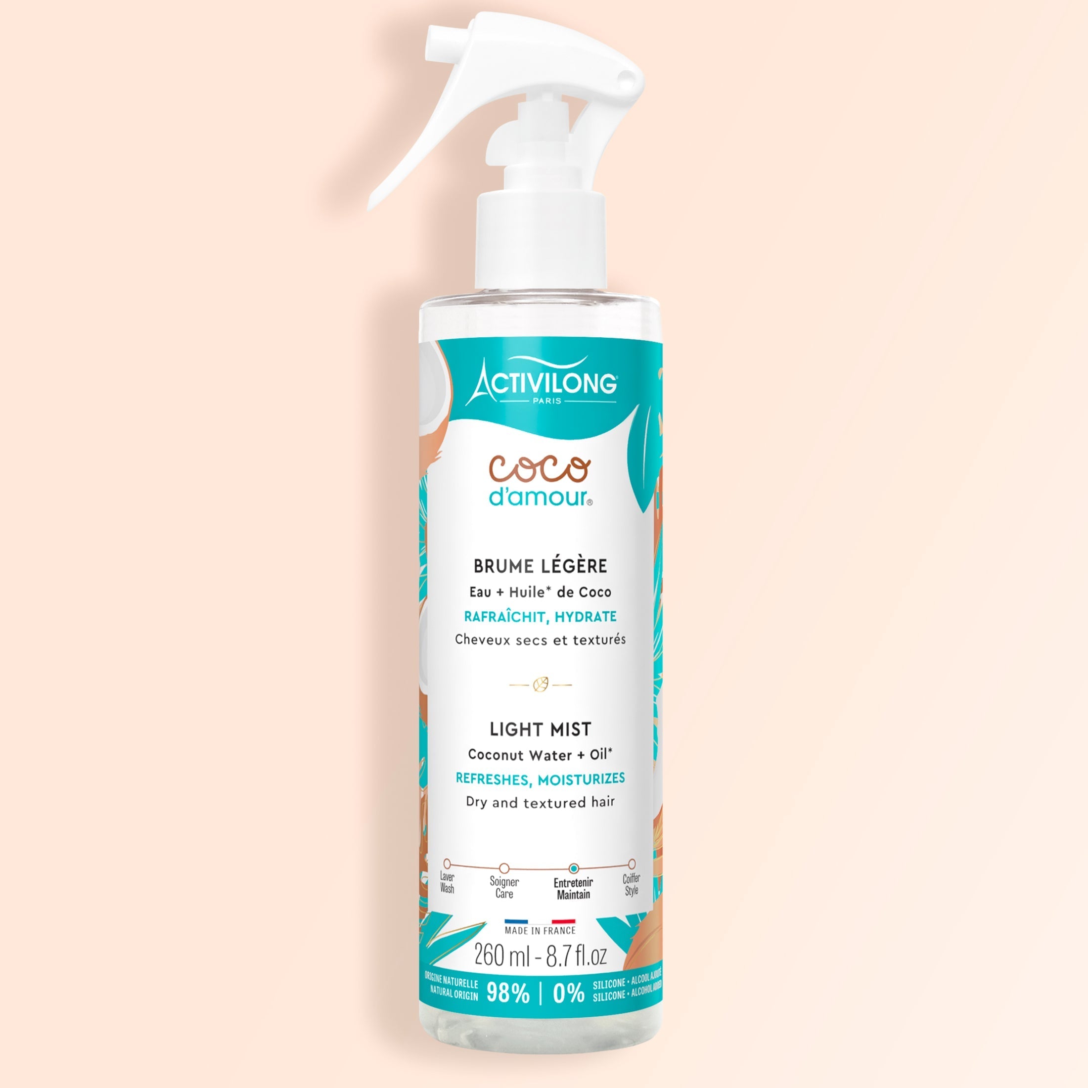Activilong Coco d'Amour light mist bottle by ABS France Wholesale on a beige background