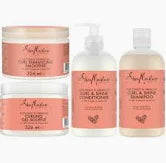 SheaMoisture Coconut & Hibiscus Curl & Shine hair care bundle, including shampoo, conditioner, and hair masque