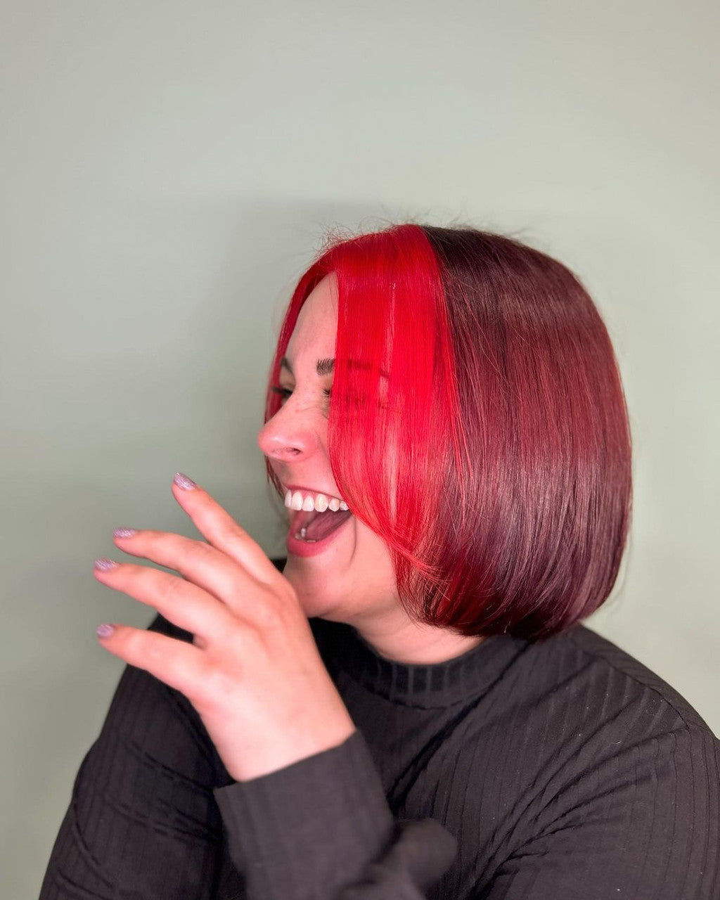 Person with a unique hairstyle featuring red and brown hair against a plain background - Afro Beauty Store