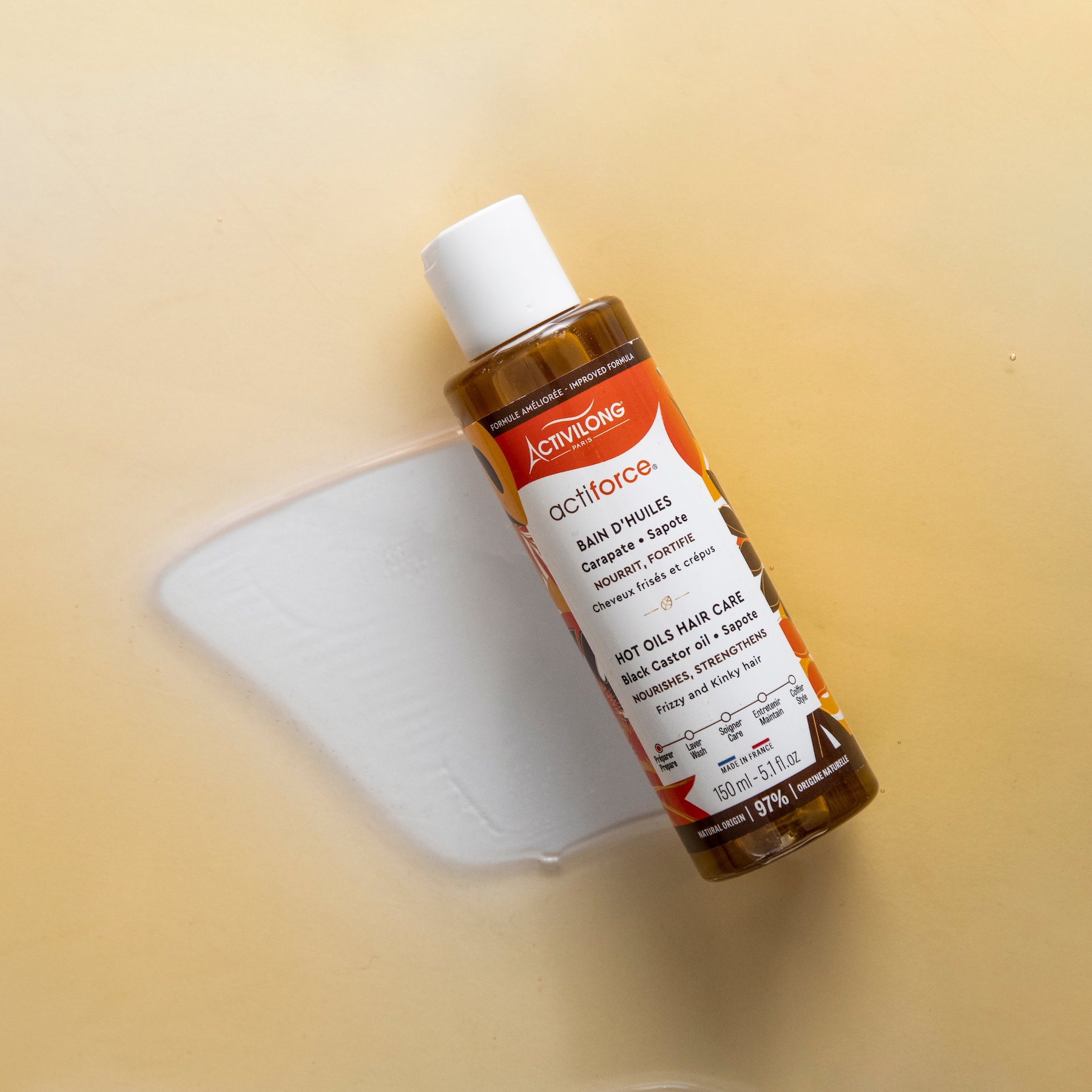 ACTIVILONG ACTIFORCE Bain d'Huile 130ml Bottle by Afro Beauty Store on a blurred background