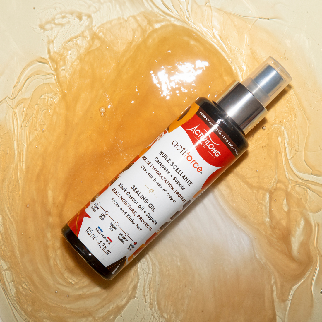 ACTIVILONG ACTIFORCE Huile Scellante 125ml bottle by Afro Beauty Store on a textured beige background
