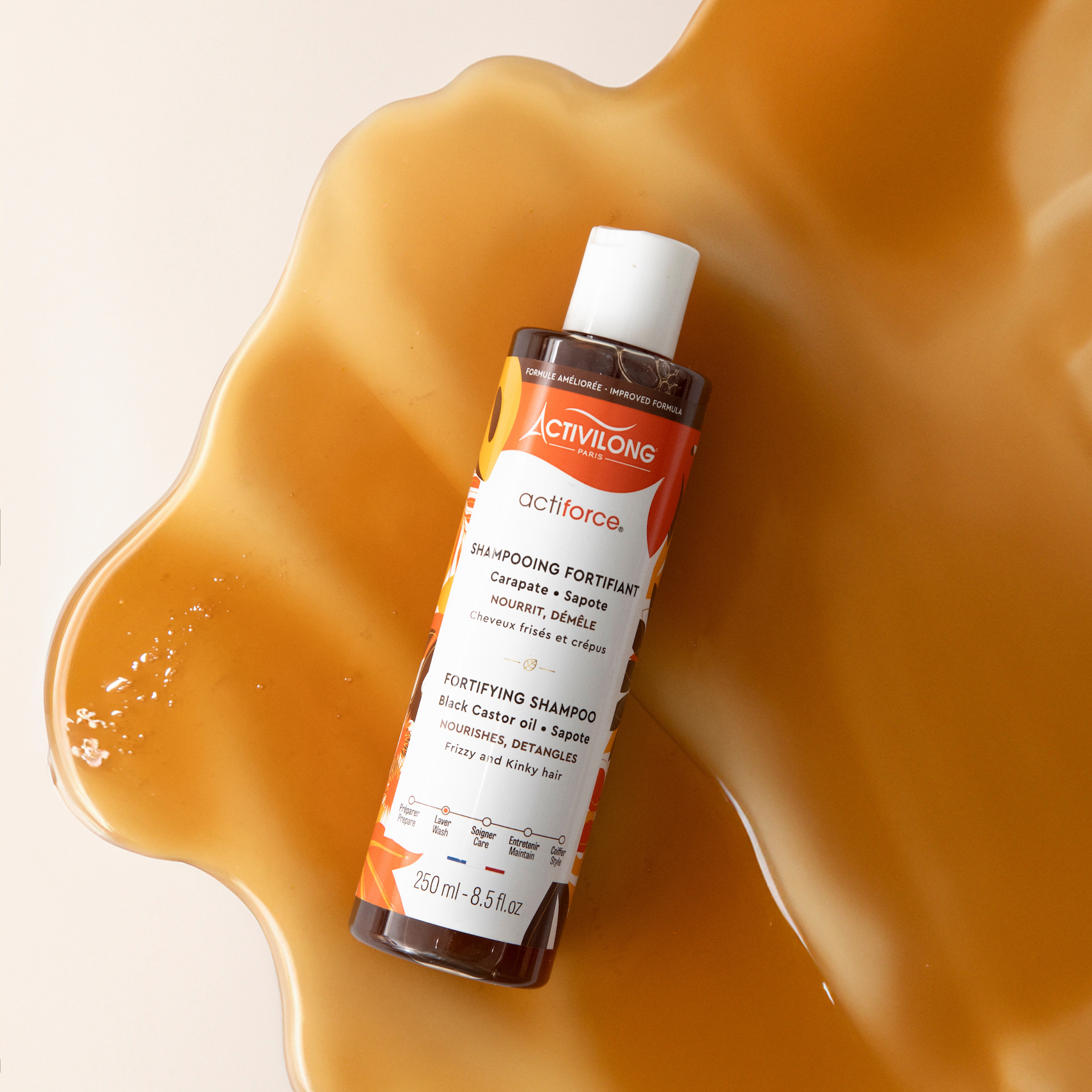 ACTIVILONG ACTIFORCE Fortifiant Shampoing 250ml bottle by Afro Beauty Store on a textured orange background