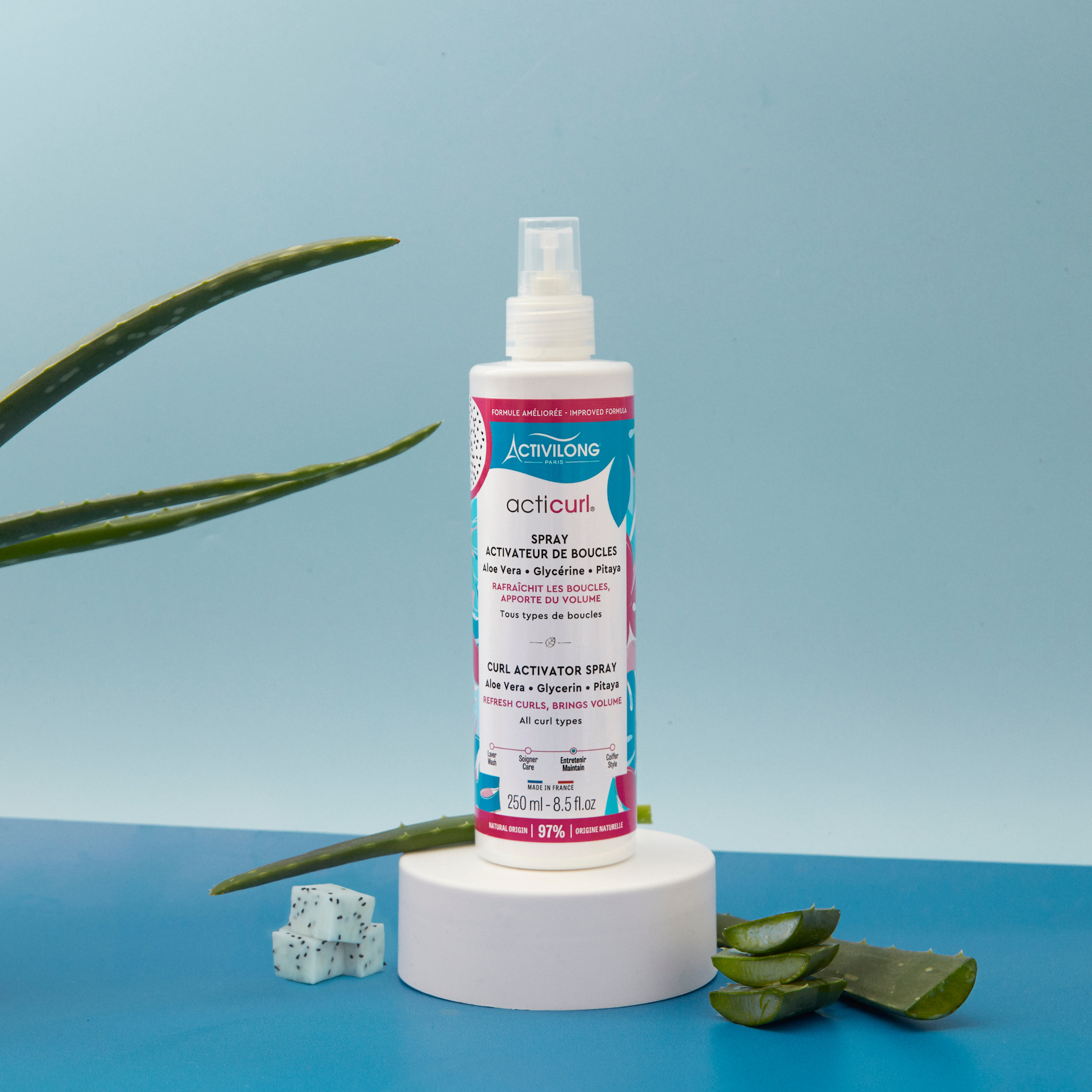 Bottle of ACTIVILONG ACTICURL Spray Activateur 250ml with aloe vera leaves and Pitaya by Afro Beauty Store